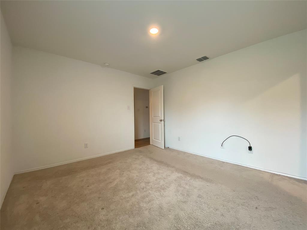 5911 Nyquist Way Forney, TX 75126 - Photo 21 of 38 a view of an empty room
