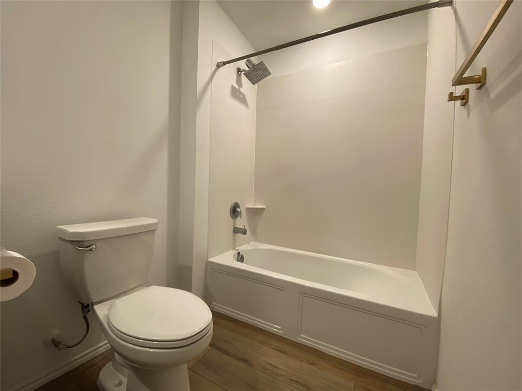 5911 Nyquist Way Forney, TX 75126 - Photo 30 of 38 a bathroom with a sink and a toilet