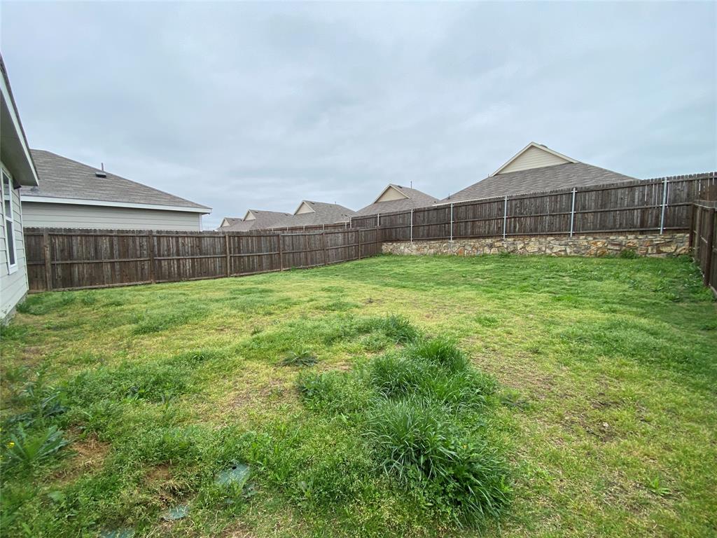 5911 Nyquist Way Forney, TX 75126 - Photo 37 of 38 a view of a house with a yard and sitting area