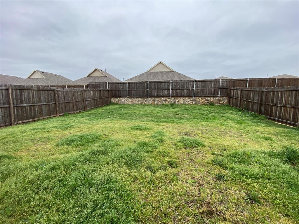 5911 Nyquist Way Forney, TX 75126 - Photo 38 of 38 a backyard of a house