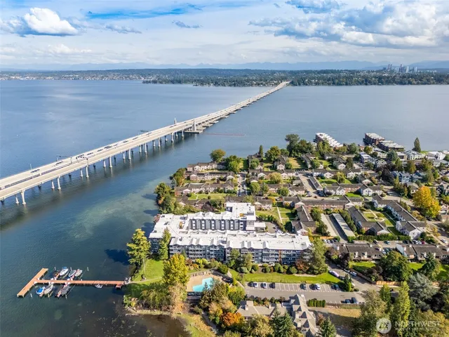 an aerial view of a house with a lake view