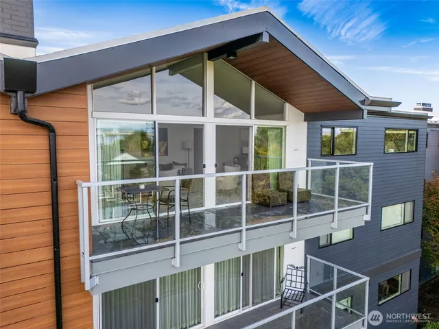 a view of a house with a large window