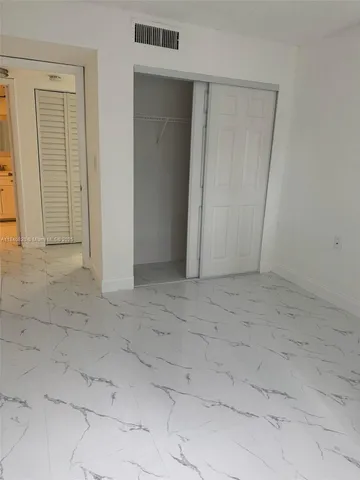 an empty room with closet