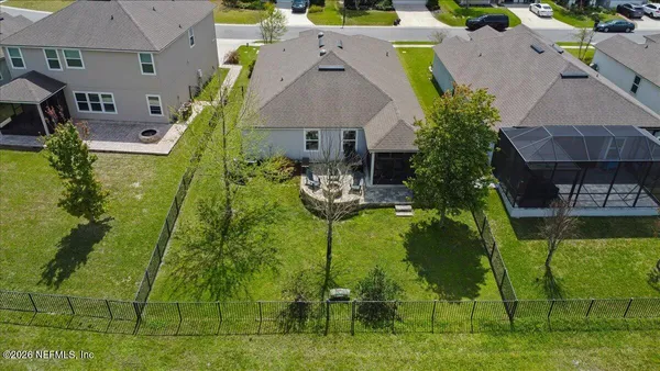 an aerial view of a house with a garden