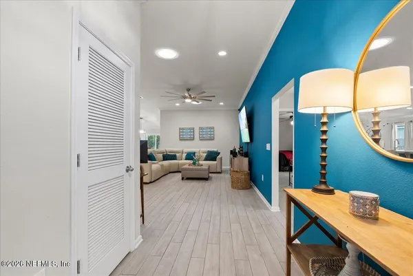 a view of a living room and bathroom