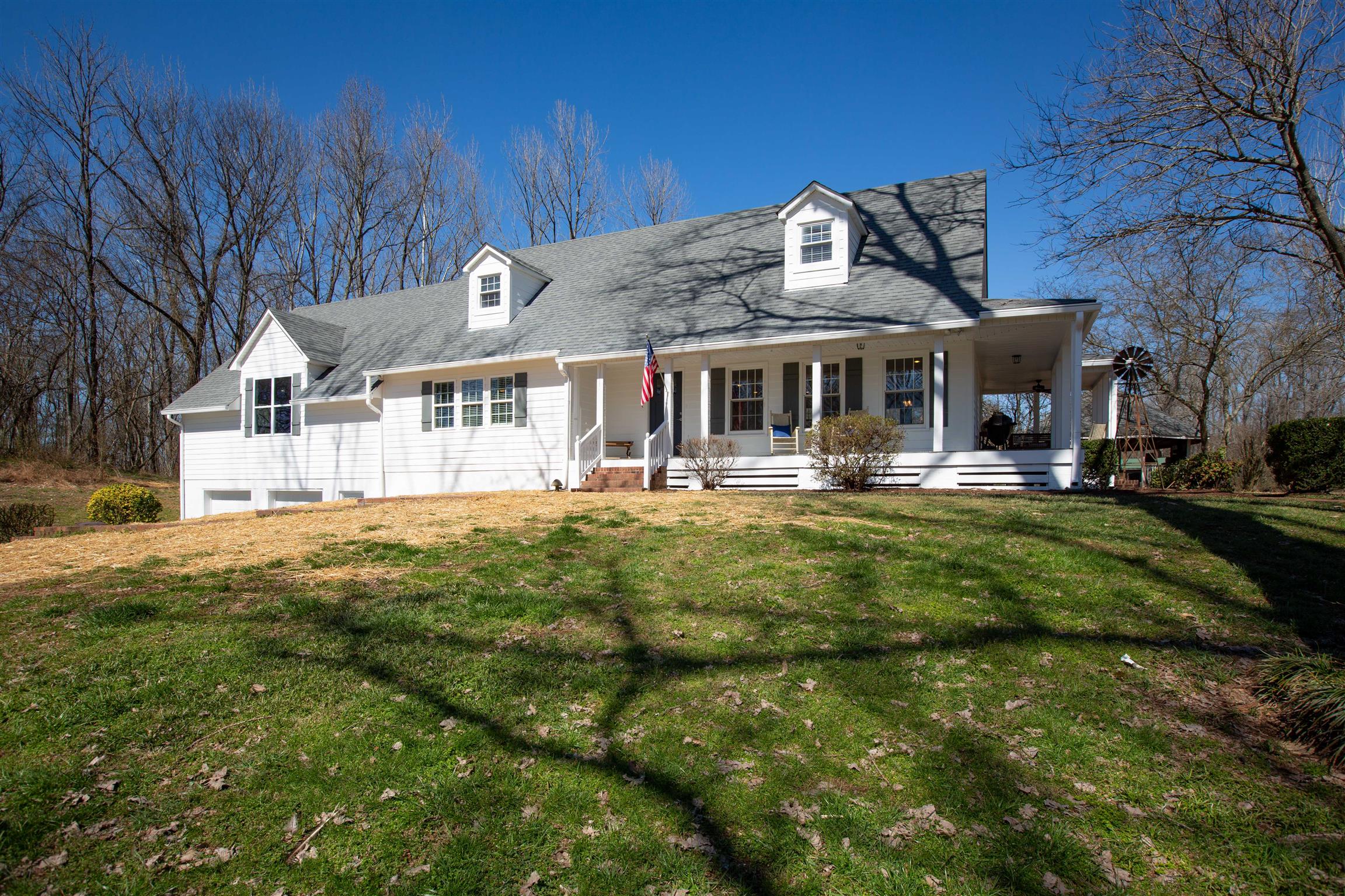 700 Baker Road Columbia, TN 38401 - Photo 1 of 30 a front view of a house with garden