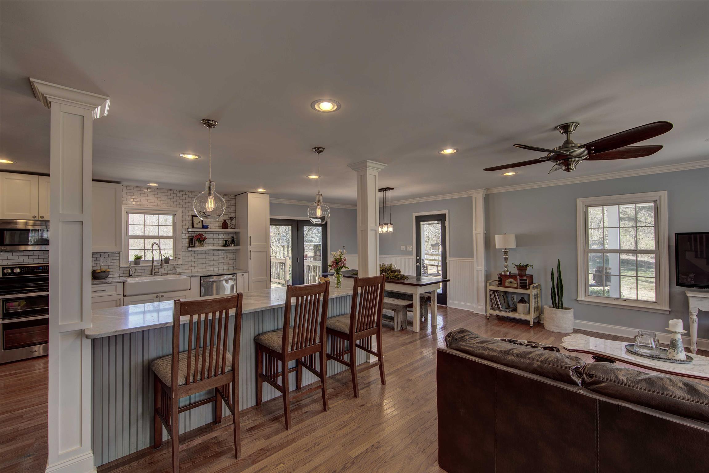 700 Baker Road Columbia, TN 38401 - Photo 29 of 30 a large kitchen with lots of counter space a sink and dining table