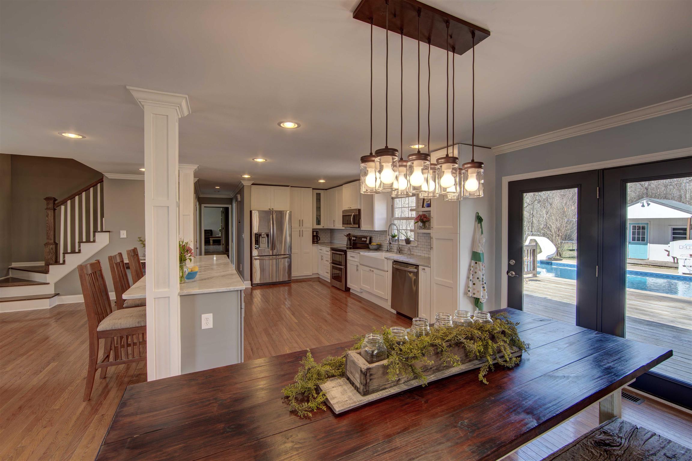 700 Baker Road Columbia, TN 38401 - Photo 14 of 30 a living room with furniture and a chandelier