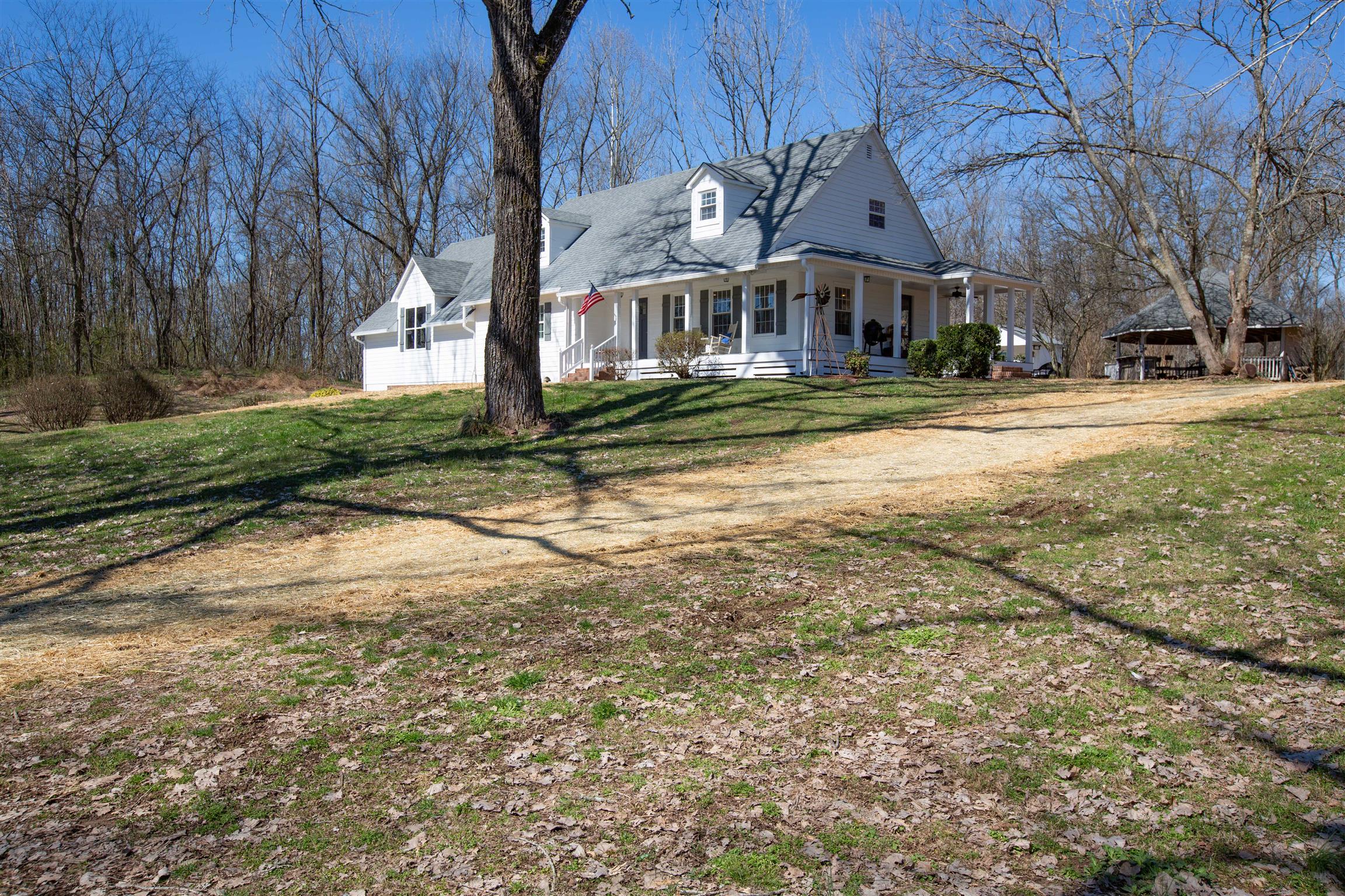 700 Baker Road Columbia, TN 38401 - Photo 4 of 30 a front view of a house with a yard