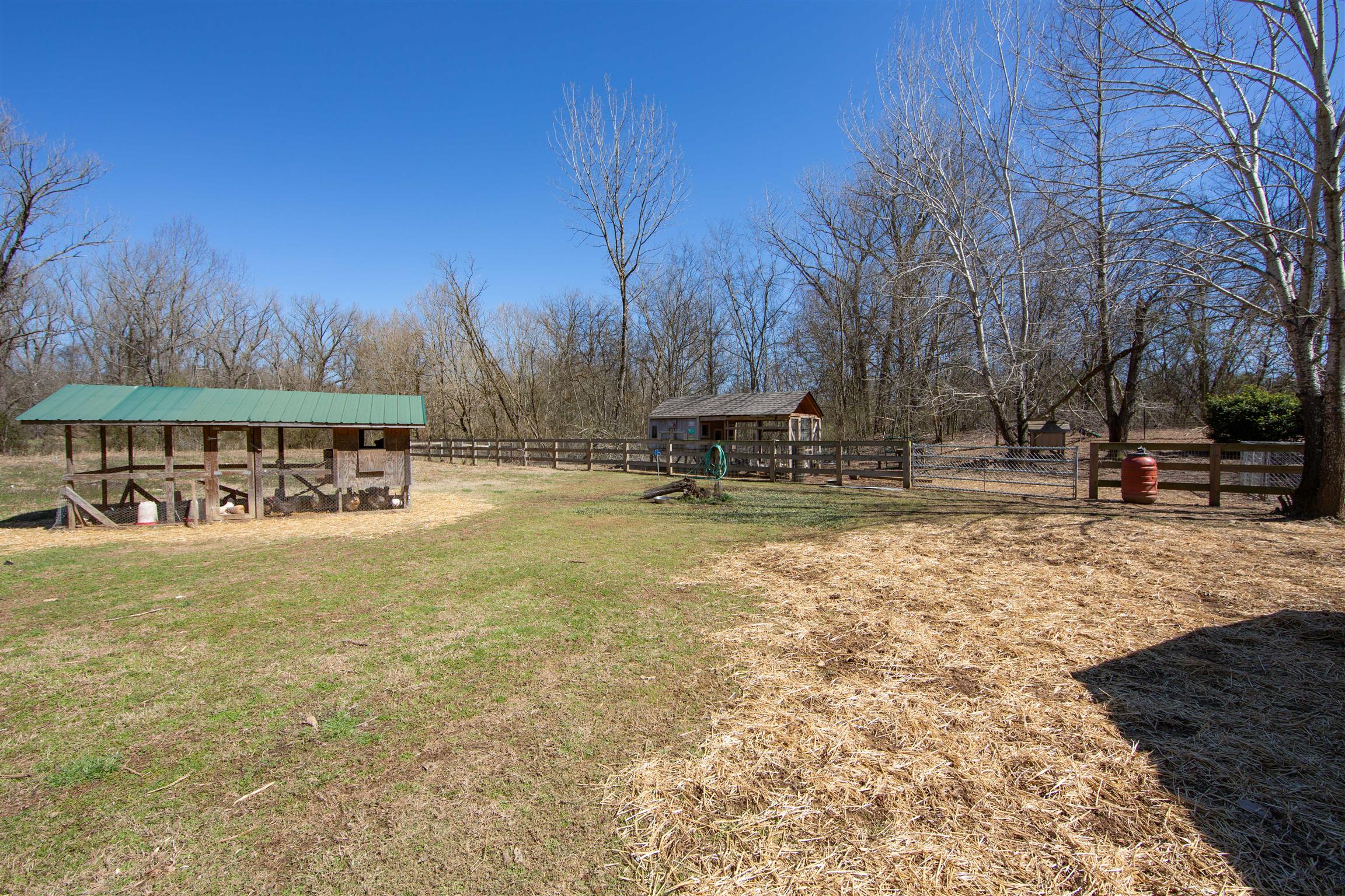 700 Baker Road Columbia, TN 38401 - Photo 10 of 30 a backyard of a house with table and chairs