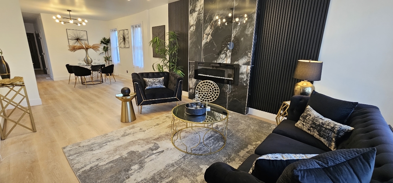 1117 West 57th Street Chicago, IL 60621 - Photo 2 of 24 a bedroom with furniture and a mirror