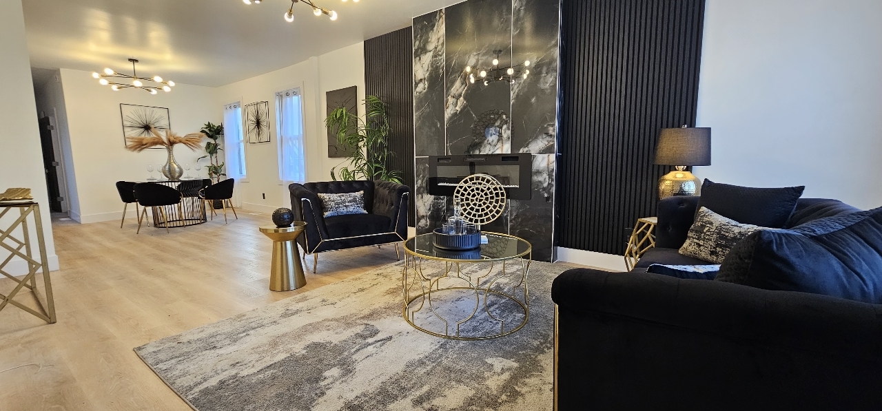 1117 West 57th Street Chicago, IL 60621 - Photo 3 of 24 a living room with furniture and a lamp