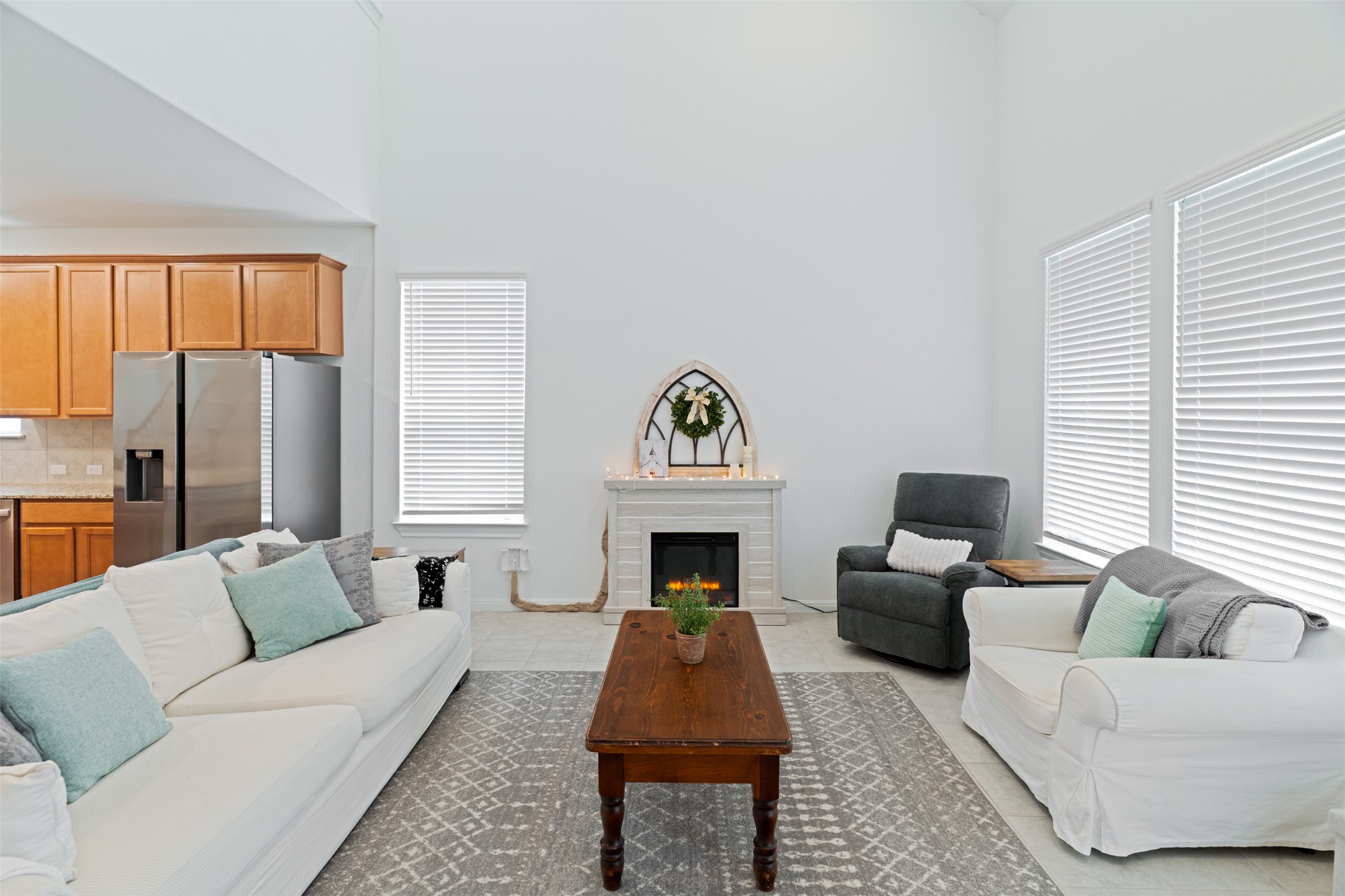 237 Rain Lily Lane Georgetown, TX 78626 - Photo 13 of 20 a living room with furniture a fireplace and a window