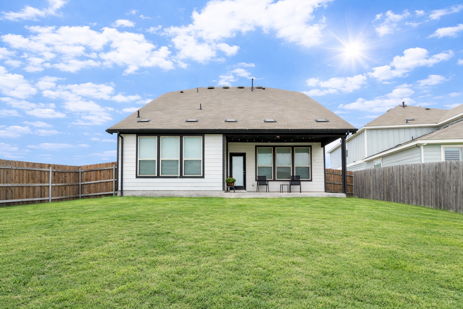 237 Rain Lily Lane Georgetown, TX 78626 - Photo 19 of 20 a view of a house with a yard and sitting area