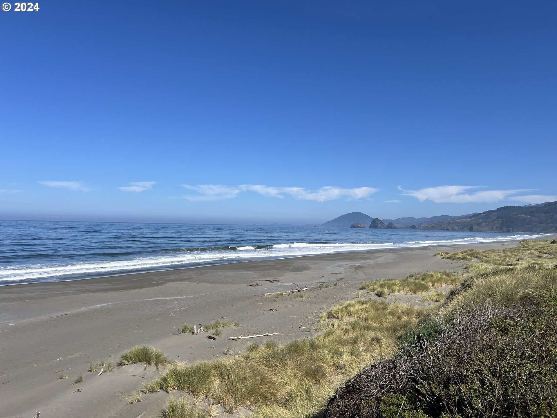 Mutts Gold Beach, OR 97444 - Photo 7 of 22 a view of an ocean and beach