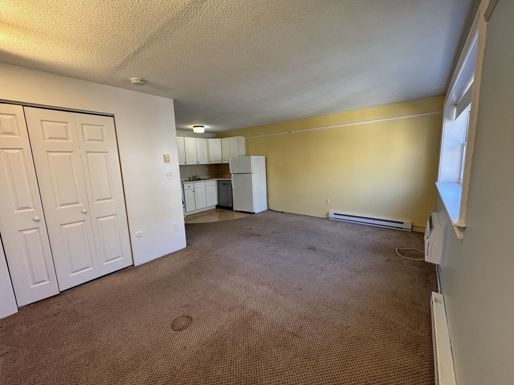 1691 Cambridge Street, Unit 42 Cambridge, MA 02138 - Photo 9 of 16 a view of a storage & utility room