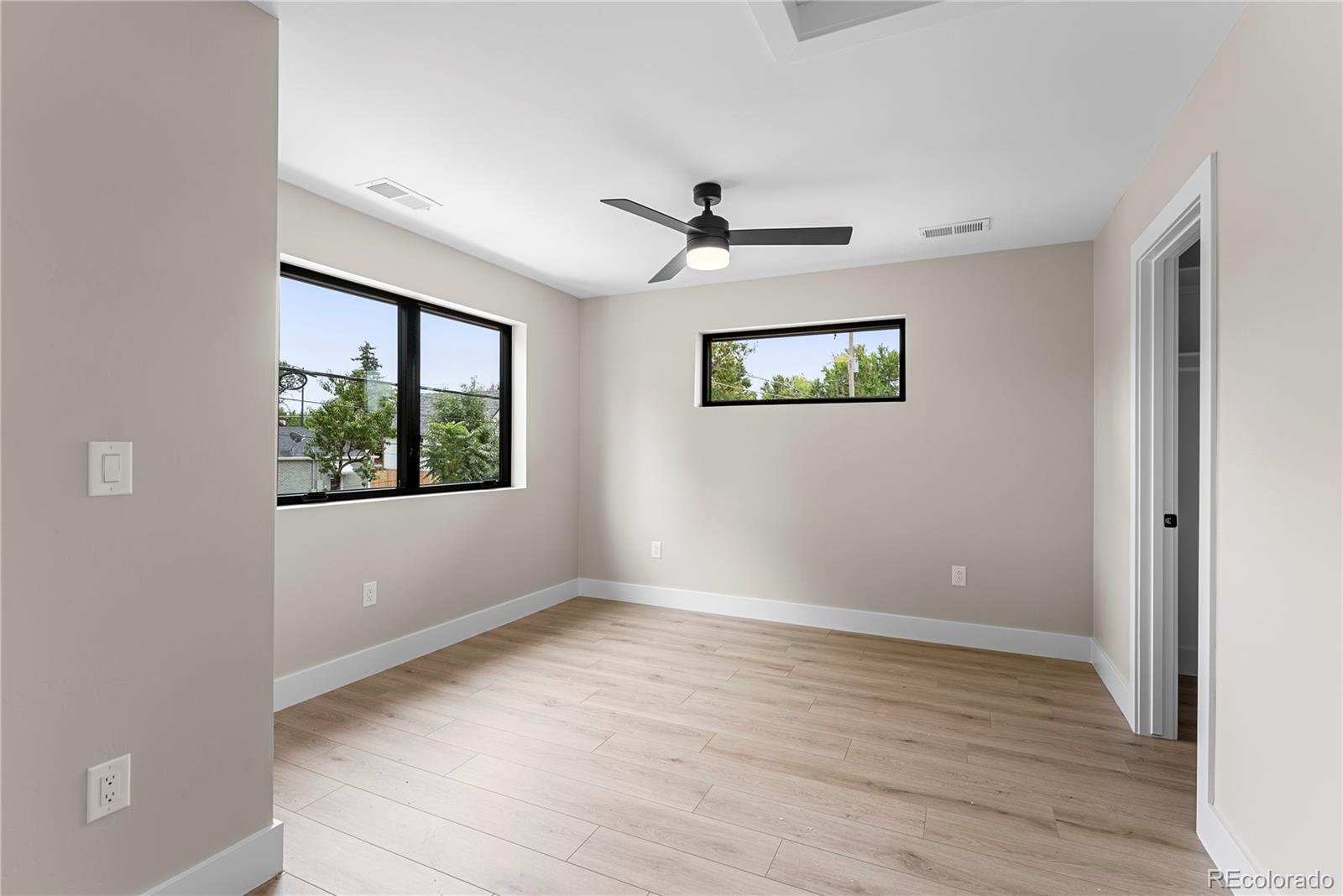 4494 Meade Street Denver, CO 80211 - Photo 29 of 36 wooden floor in an empty room with a window