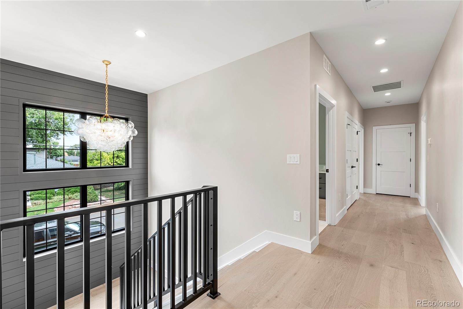 4494 Meade Street Denver, CO 80211 - Photo 10 of 36 a view of hallway with stairs