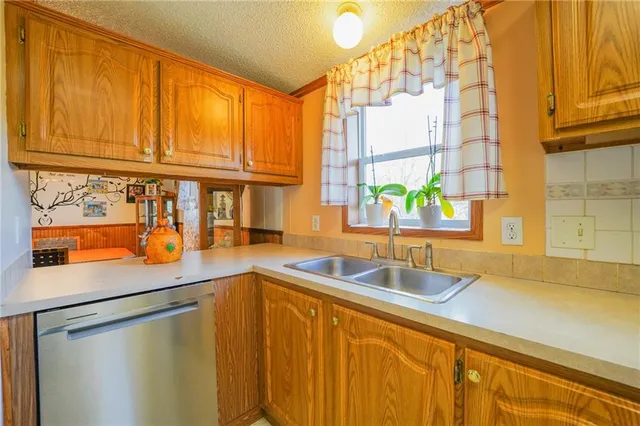 a bathroom with mirror sink and vanity