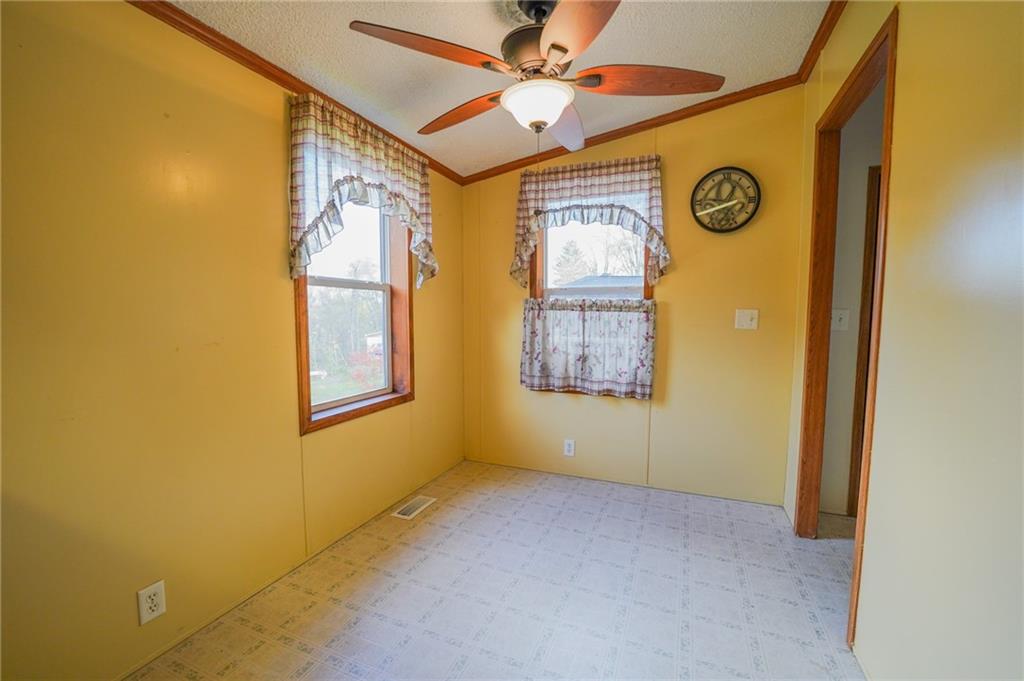 204 Hollowvue Road Wampum, PA 16157 - Photo 17 of 46 a view of an empty room with a window