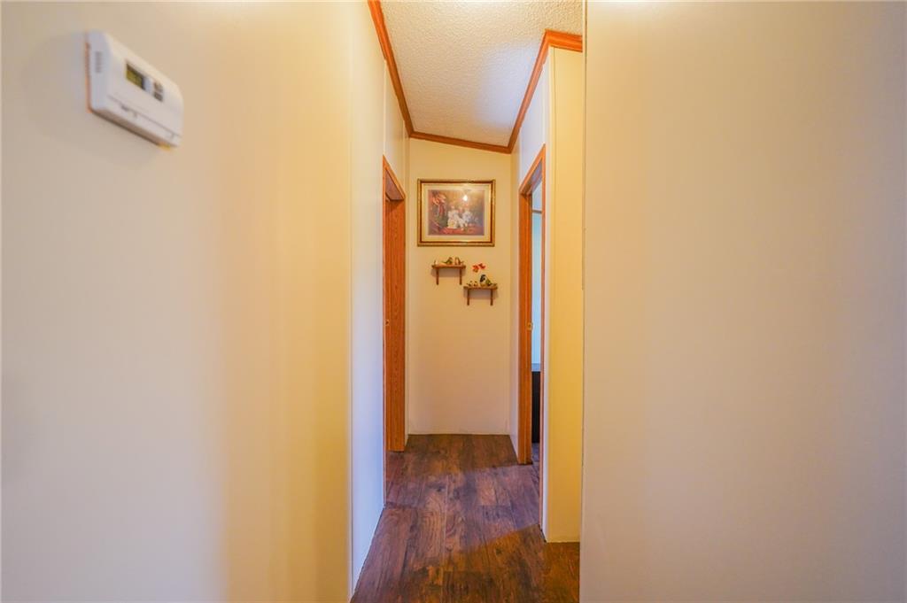 204 Hollowvue Road Wampum, PA 16157 - Photo 20 of 46 a view of a hallway with wooden floor