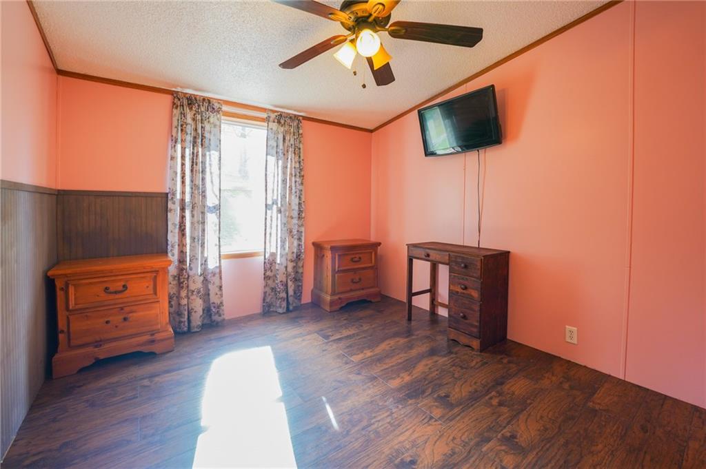 204 Hollowvue Road Wampum, PA 16157 - Photo 22 of 46 a living room with furniture and a flat screen tv