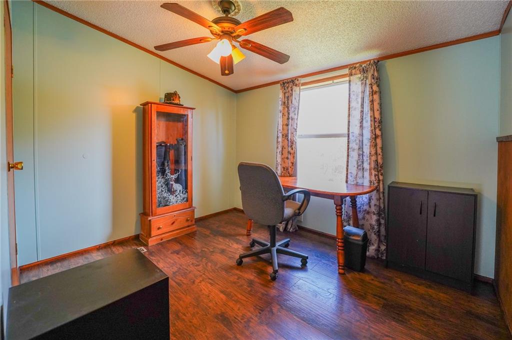 204 Hollowvue Road Wampum, PA 16157 - Photo 25 of 46 a view of a workspace with furniture and a window
