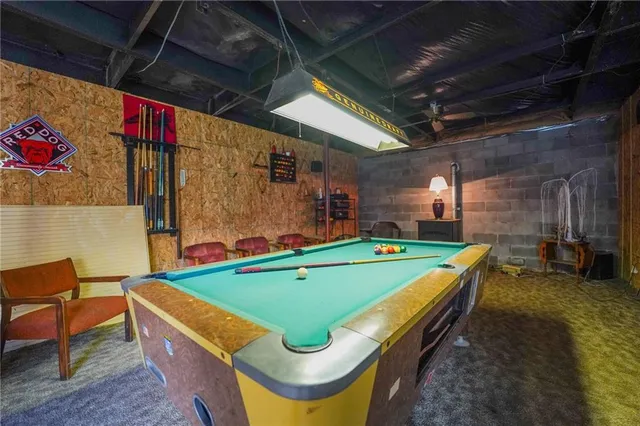 a view of a balcony with chairs