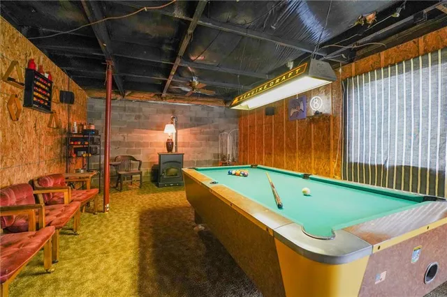 a view of a chair and table on the deck