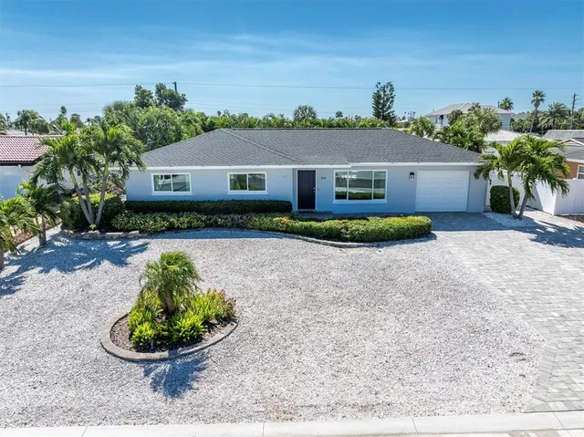 front view of house with a yard