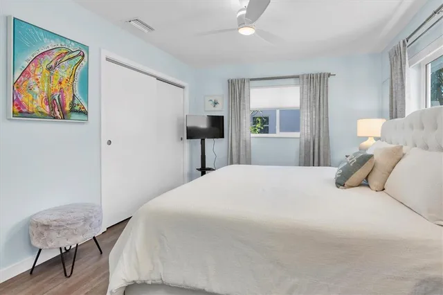 a bathroom with a sink vanity and a mirror