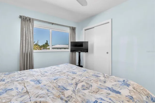 a bathroom with a sink mirror toilet and shower
