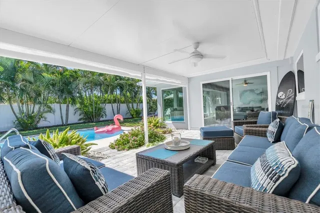 a view of a chairs and table in the patio