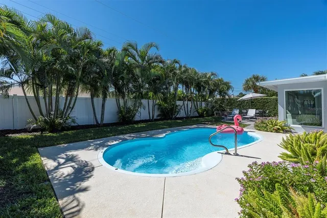 a view of a house with a swimming pool