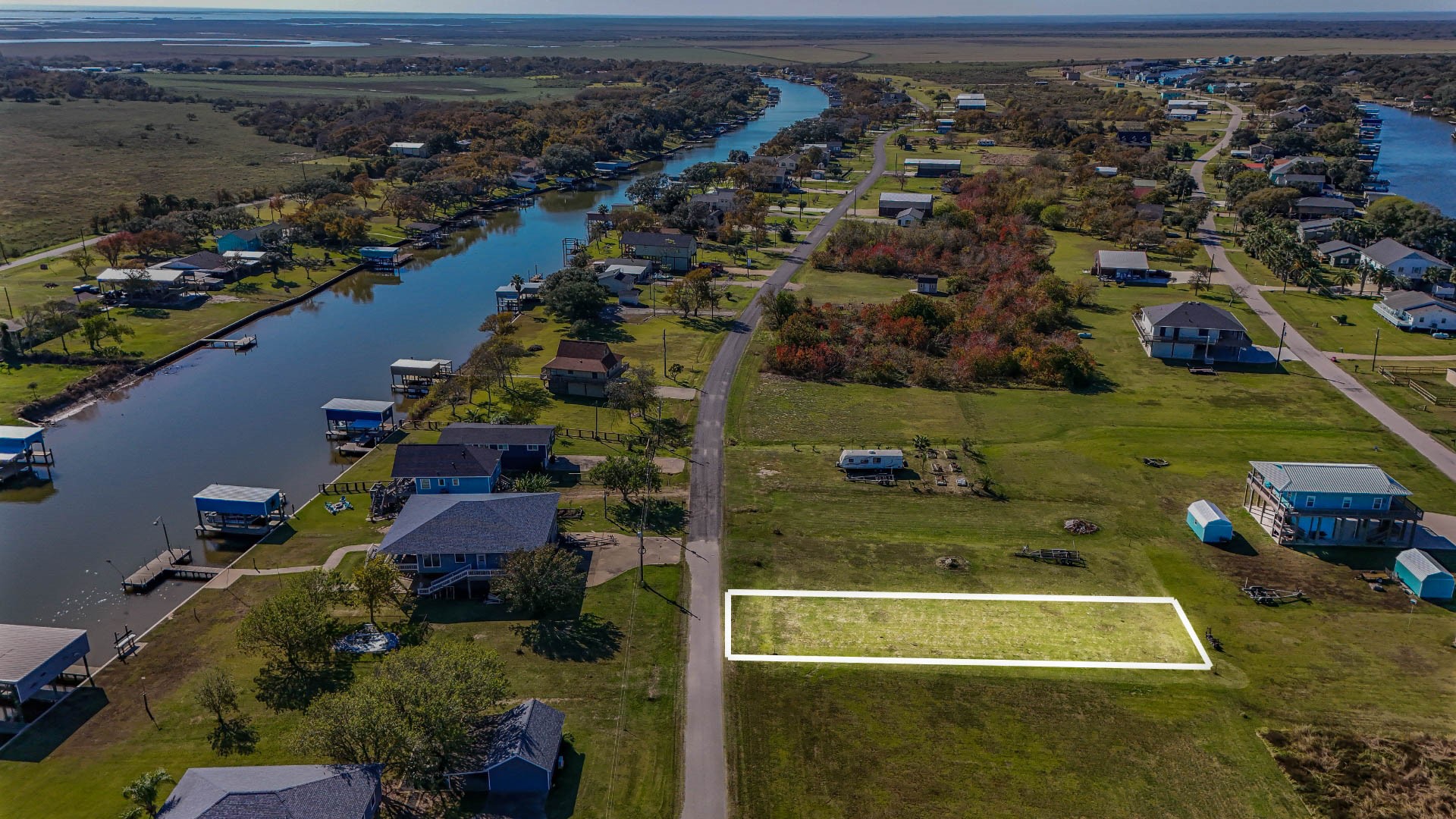 41 County Road 291 Sargent, TX 77414 - Photo 3 of 13 an aerial view of residential houses with outdoor space