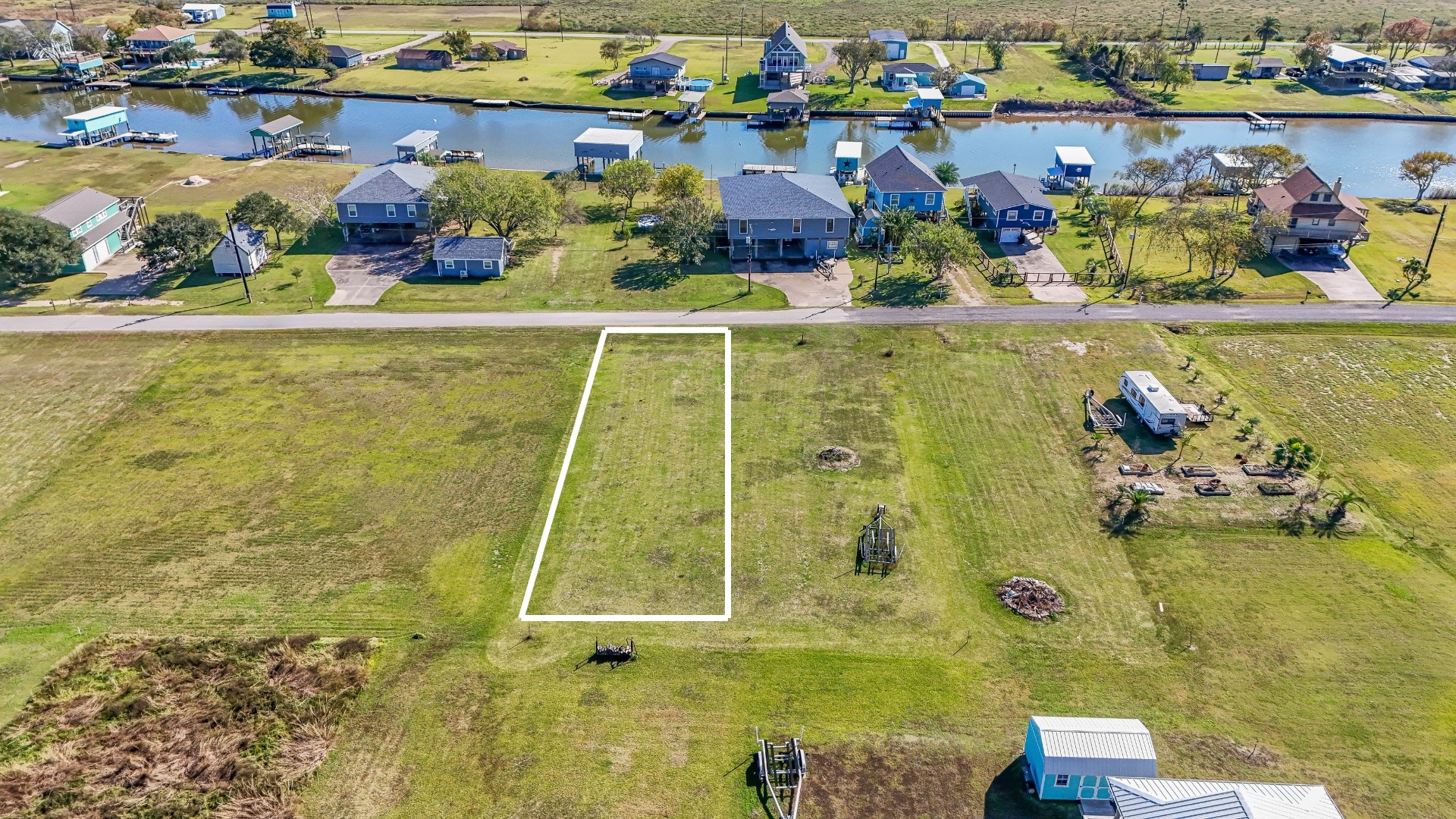 41 County Road 291 Sargent, TX 77414 - Photo 7 of 13 an aerial view of residential house with outdoor space and swimming pool
