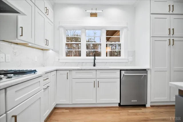 a bathroom with a sink a vanity and a mirror