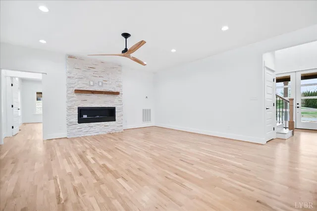 a view of a balcony with wooden floor