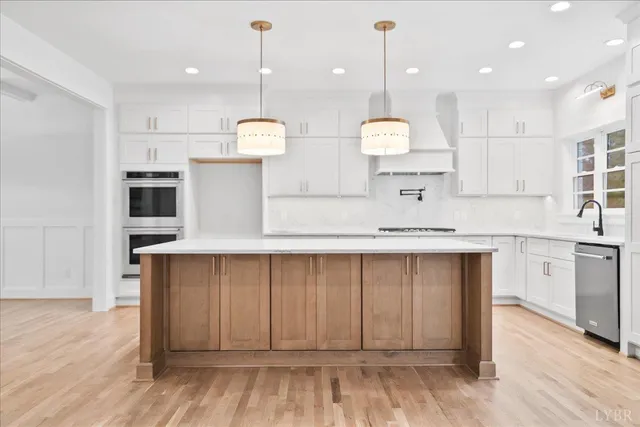 a bathroom with a shower toilet and sink
