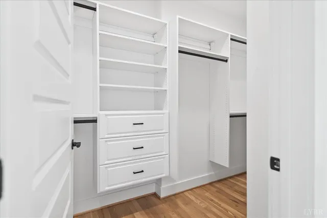 a bathroom with a shower toilet and sink