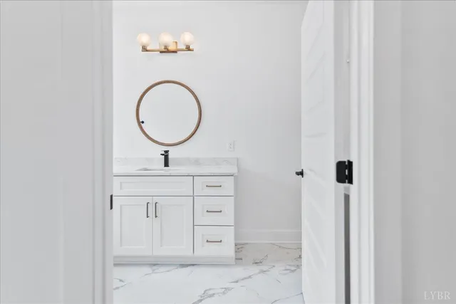 a view of an empty room and glass door