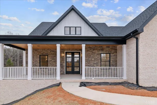 a view of a porch with wooden floor and outdoor space