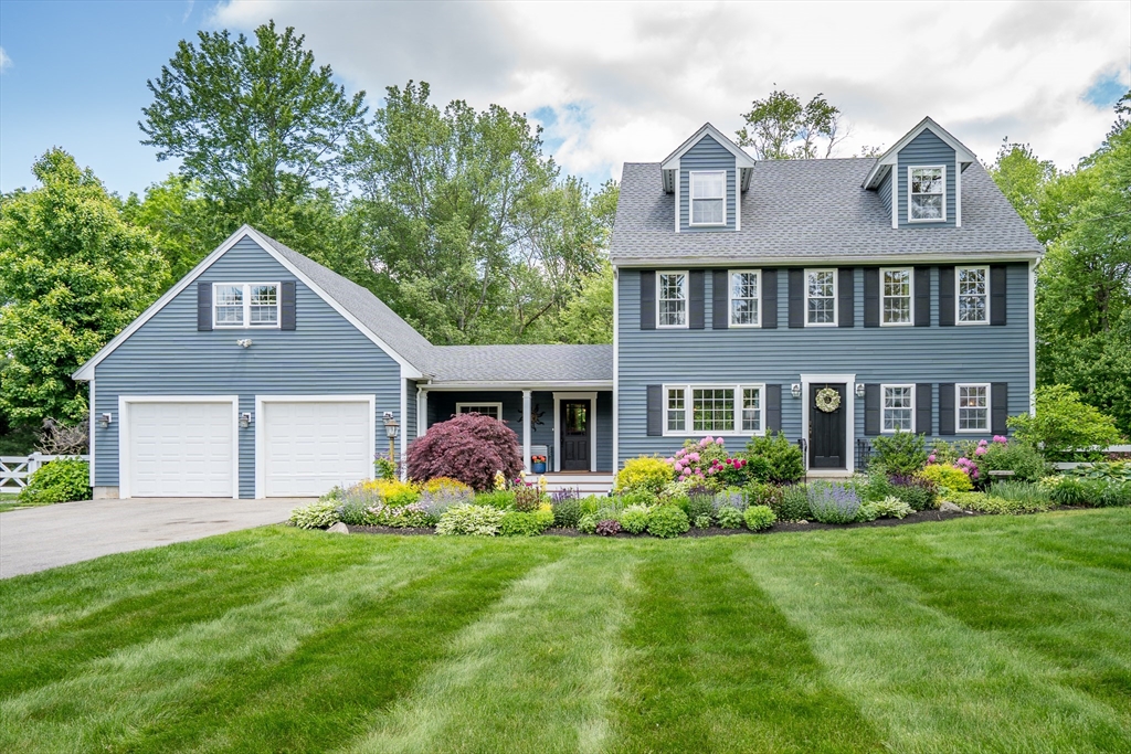 21 Boutwell Road Andover, MA 01810 - Photo 1 of 37 a front view of house with yard and green space