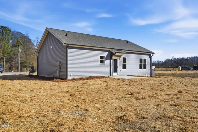 a house with trees in front of it