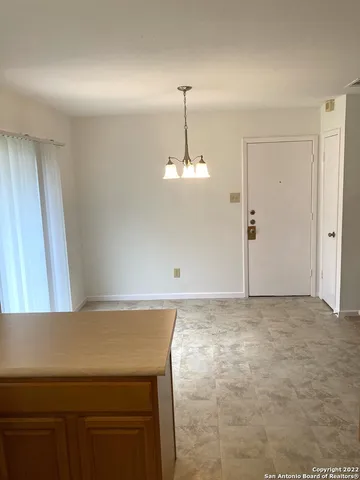 a view of a kitchen with a sink and dishwasher