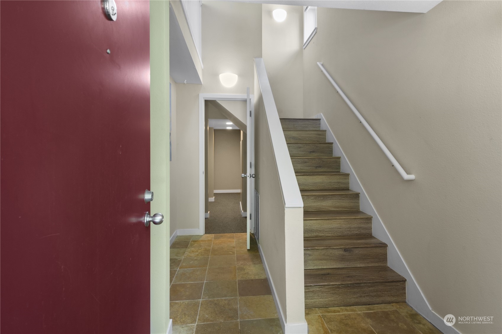 6713 35th Place South Seattle, WA 98118 - Photo 2 of 30 a view of a hallway with entryway