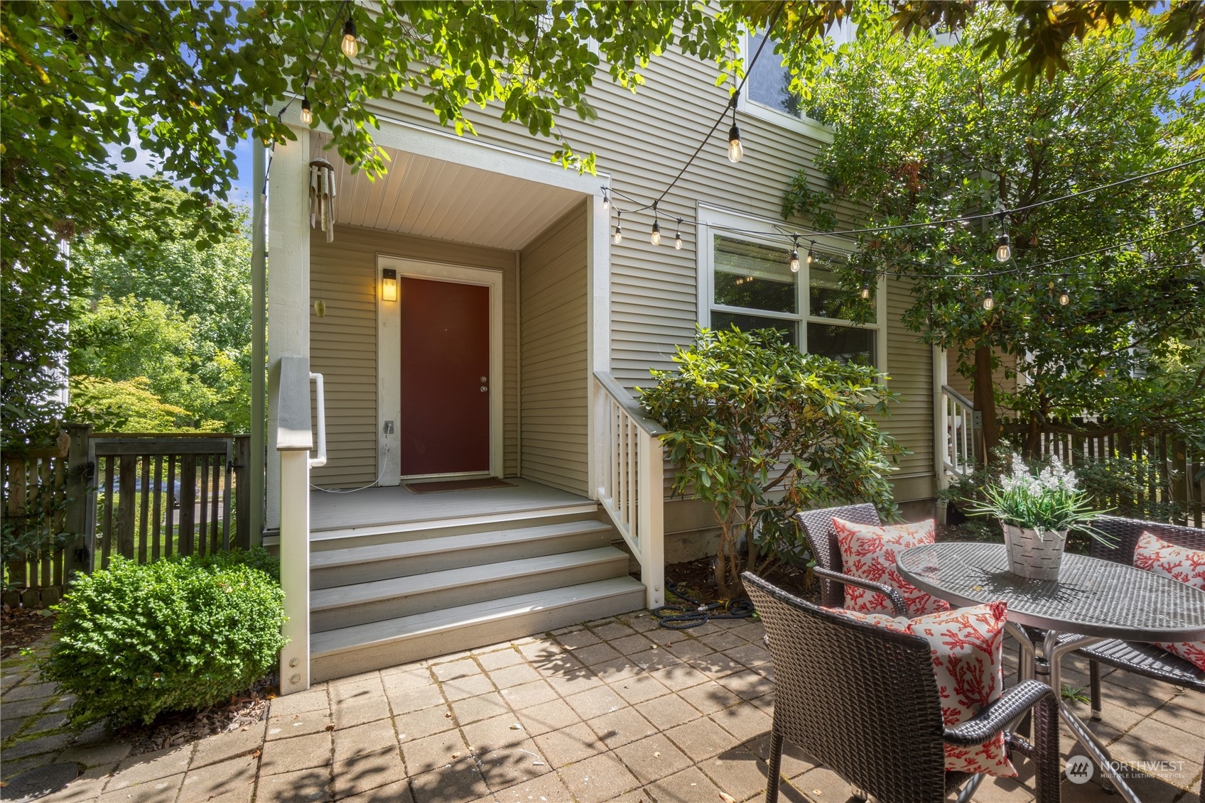 6713 35th Place South Seattle, WA 98118 - Photo 28 of 30 a view of a house with backyard and sitting area