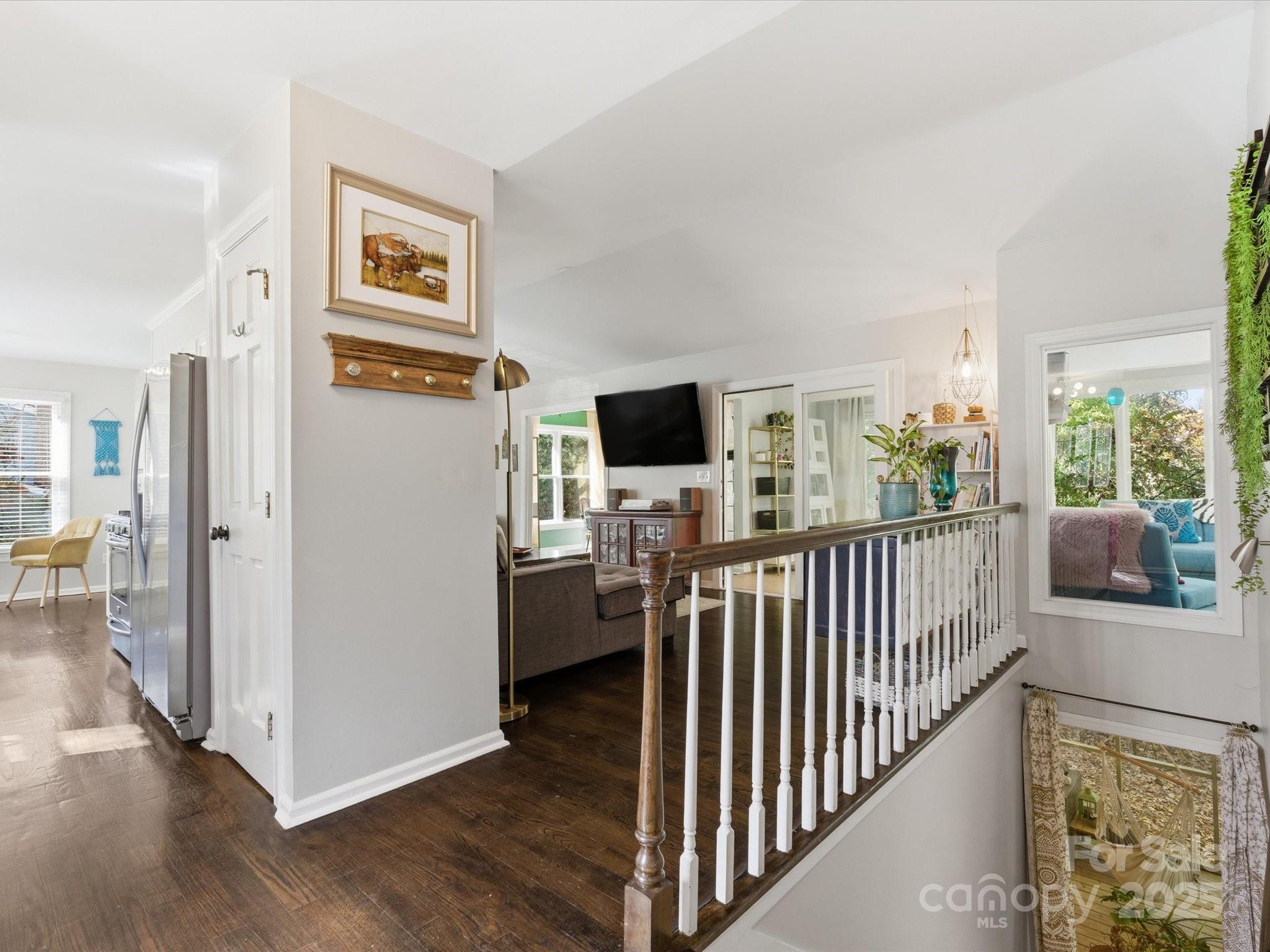 4002 Windward Drive Fort Mill, SC 29708 - Photo 14 of 41 a view of a hallway with workspace and wooden floor