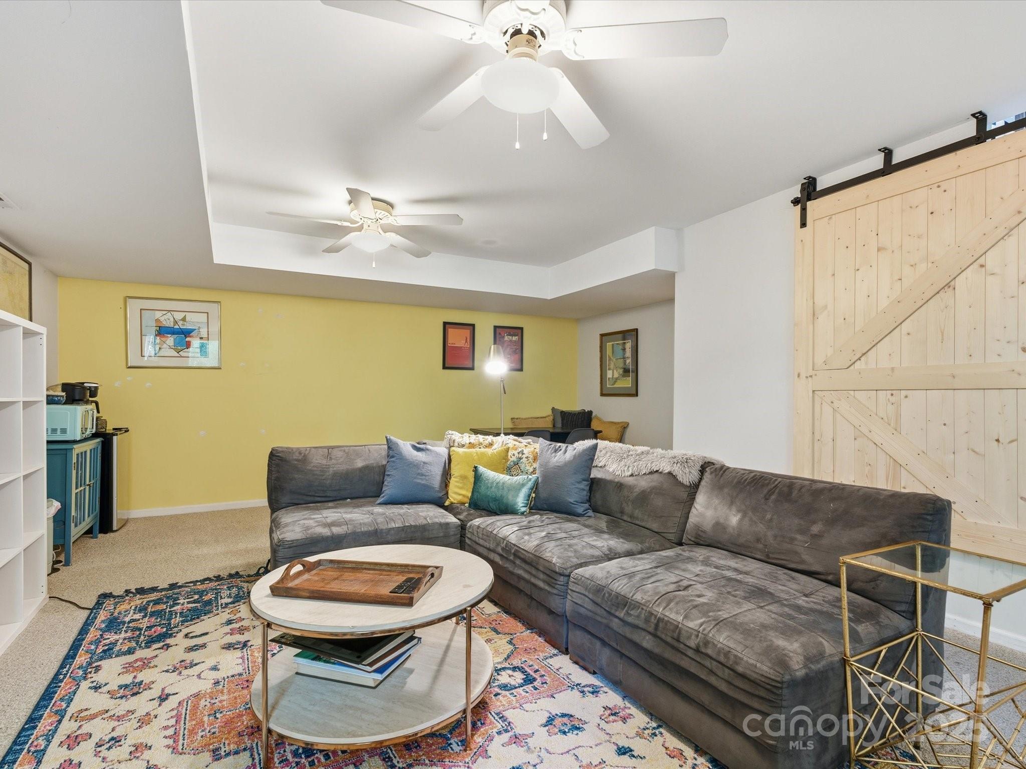 4002 Windward Drive Fort Mill, SC 29708 - Photo 16 of 41 a living room with furniture and a rug