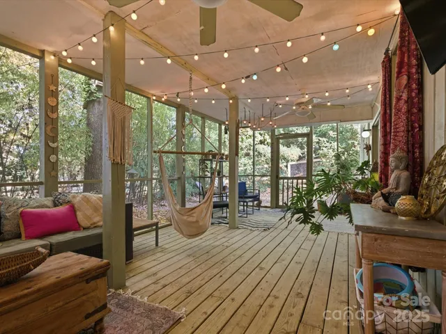 a backyard of a house with outdoor seating